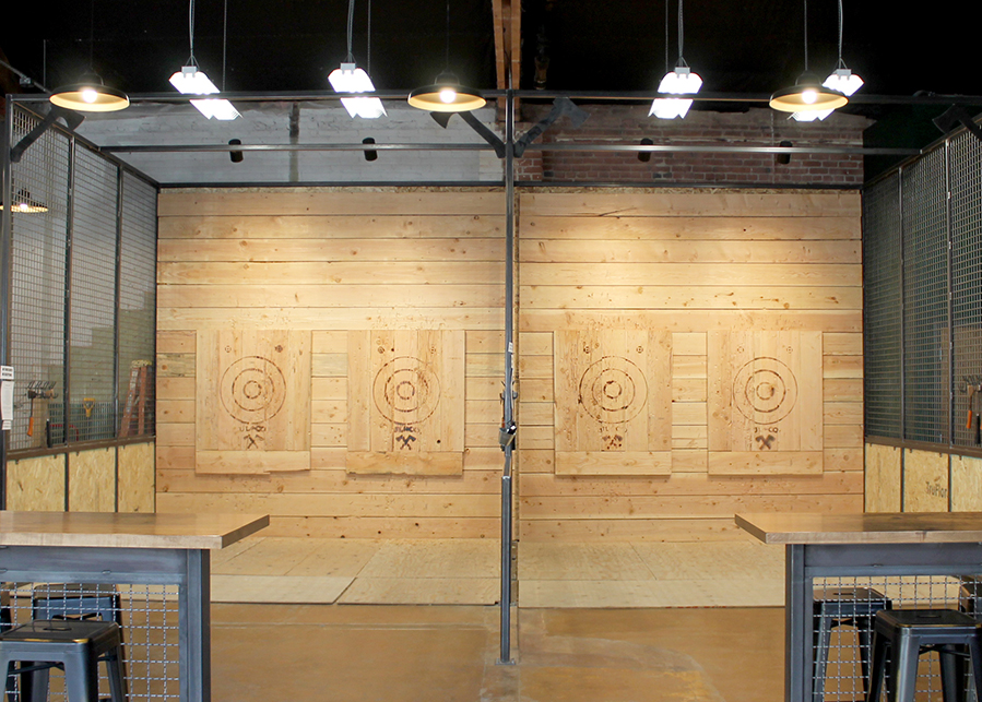 Targets for recreational axe throwing made from natural cedar with targets and points burned into the wood